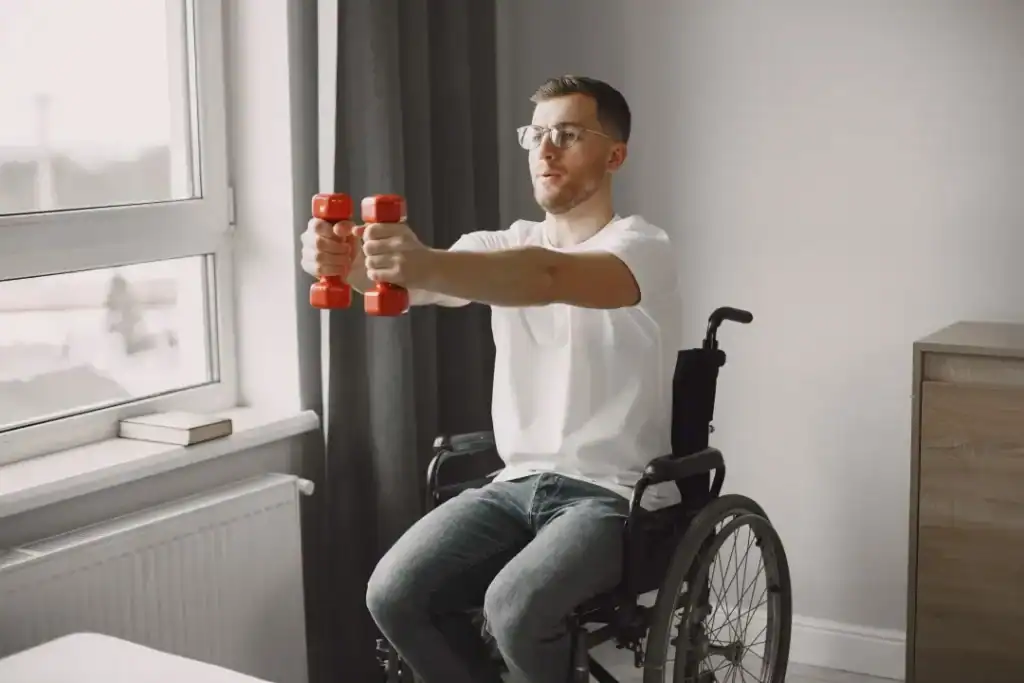Empowering Weight Loss: A Comprehensive Guide for Individuals with Disabilities 1 Image of man doing exercise in his wheelchair to aid weight loss Peterborough
