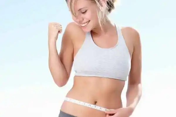 Unraveling the Mystery: Where Does the Body Fat Loss From First? 3 Image of woman happy with fat loss Peterborough